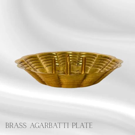 Traditional brass agarbatti plate for incense sticks during Hindu puja rituals