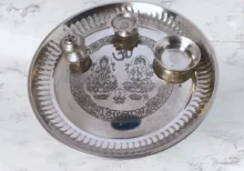 Stainless steel pooja thali with diya and incense holder for Hindu rituals